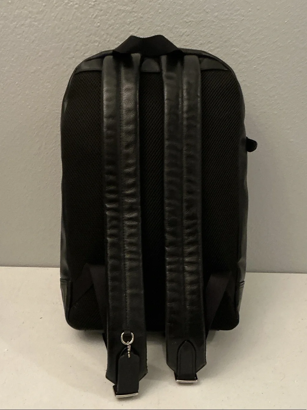 Coach Black Leather Sling Backpack with Front Pocket